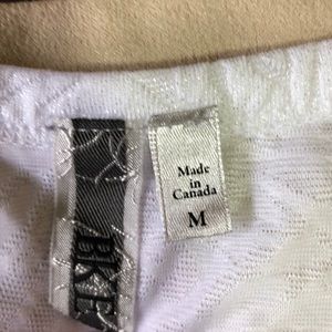 BKE Tops - BKE white shimmer long sleeve BKE Tops - BKE white shimmer long sleeve